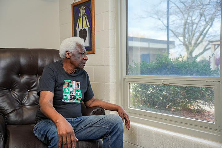 Care Resources participant looking out a window.